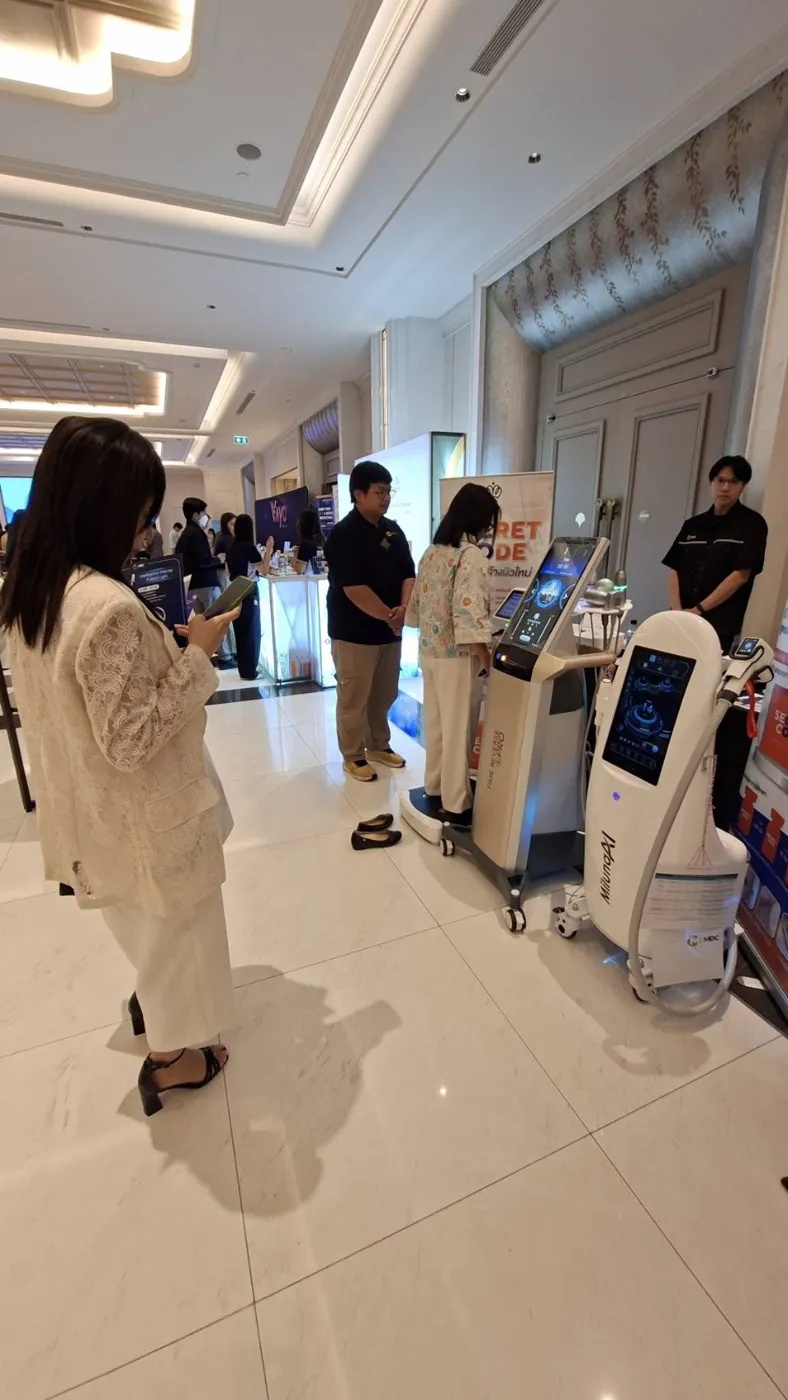 An attendee trying the body composition analyzer